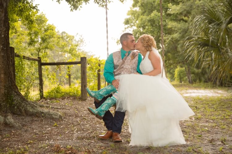 Couple on an oak tree swing